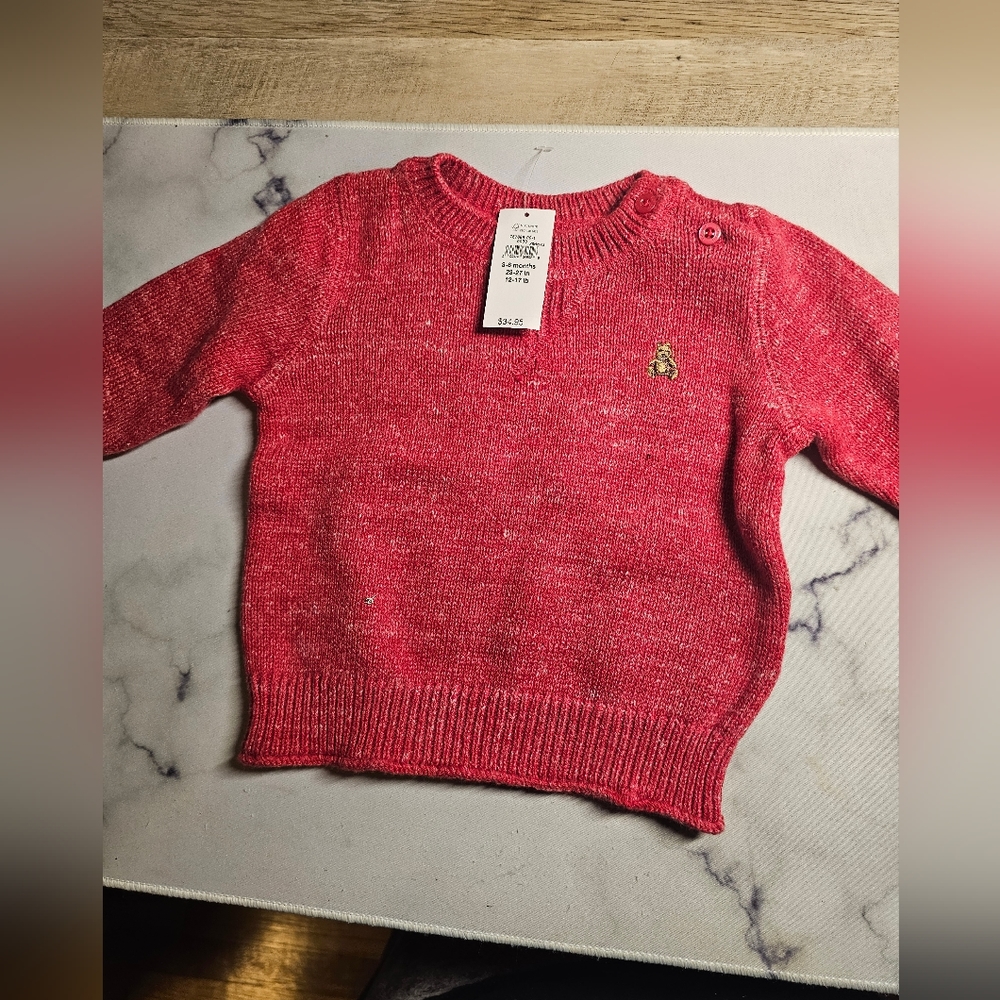 Cute red sweated baby
